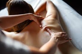 Patient receiving gentle chiropractic adjustment for spine and nervous system health