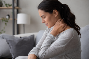 Woman in neck pain